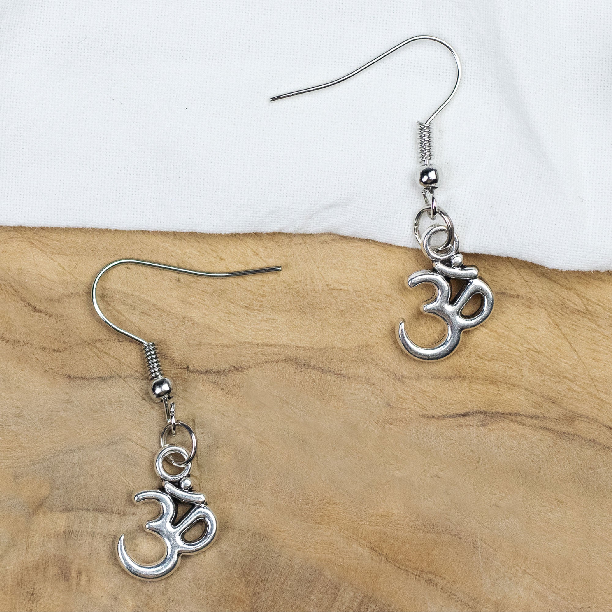 Om on sale symbol earrings